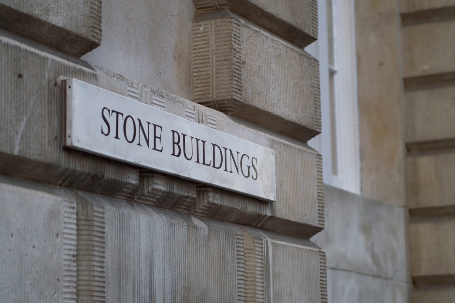 5 Stone Buildings - building sign