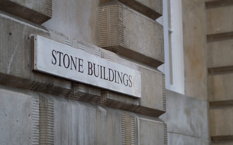 5 Stone Buildings - building sign