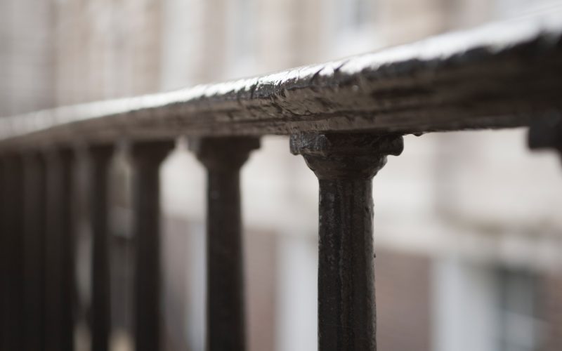 5 Stone Buildings iron railings outside